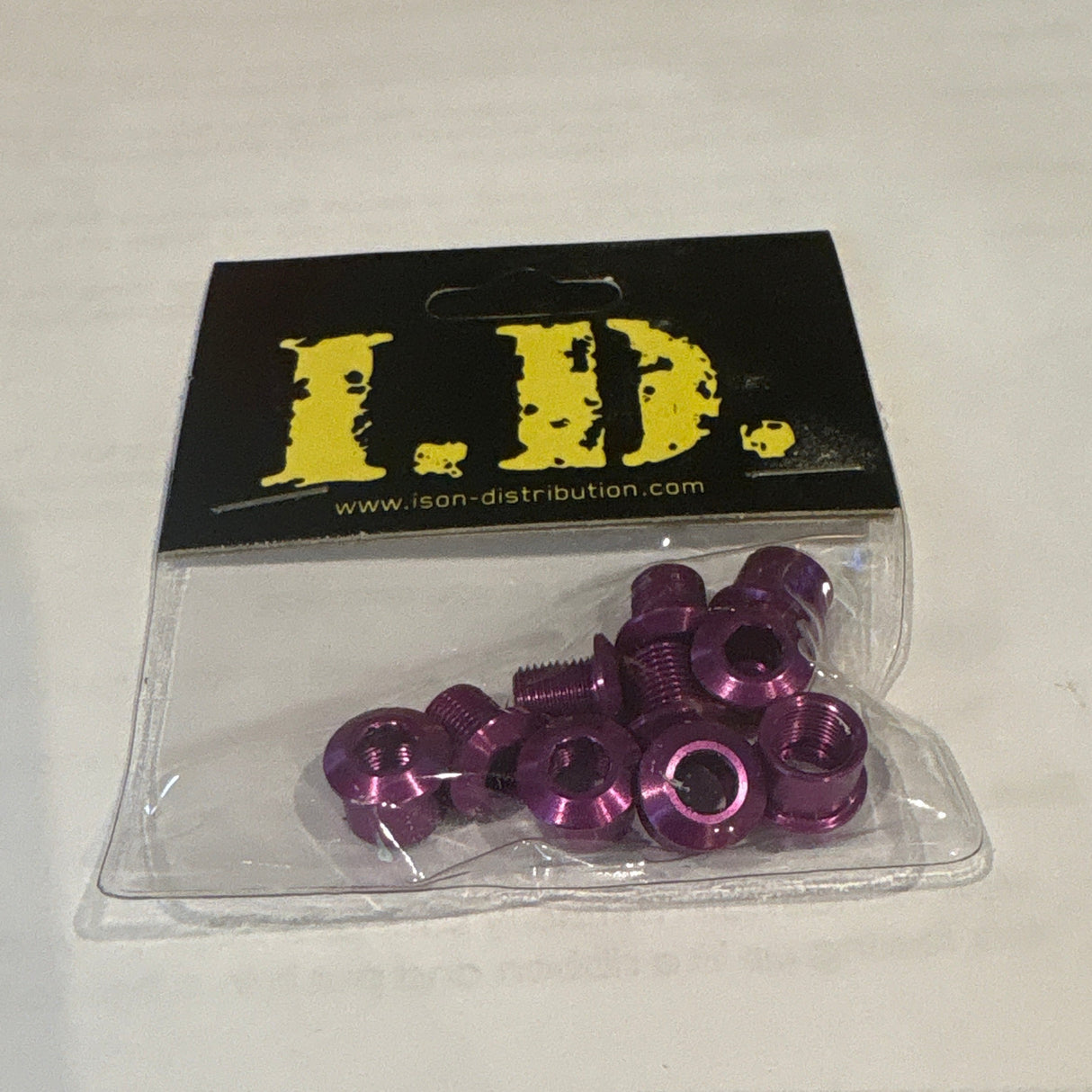 ID Alloy Chainring Bolts by SSS Racing in purple anodized aluminum, hex head, glossy finish, compact design, durable kit.