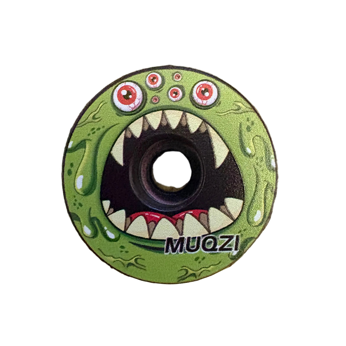 SSS Racing Stem Headset Top Cap in bright green with a multi-eyed cartoon monster, fang teeth, and glossy grip texture.