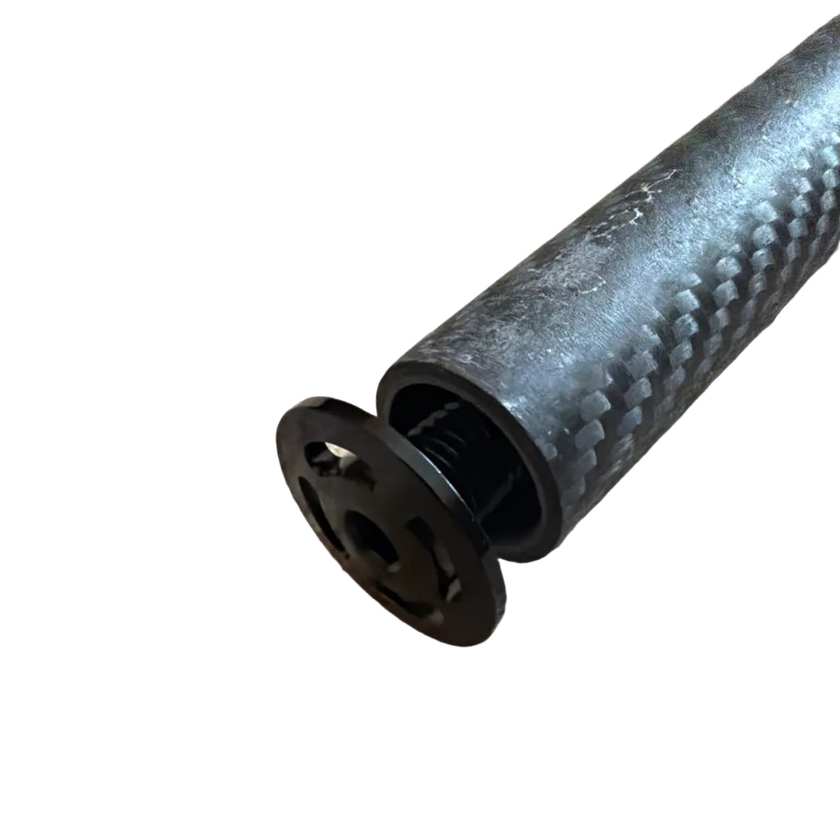 Yoshoka Carbon Fork 20 x 1"" features a dark gray textured cylinder with a checkered weave and inner metallic ring. with edge