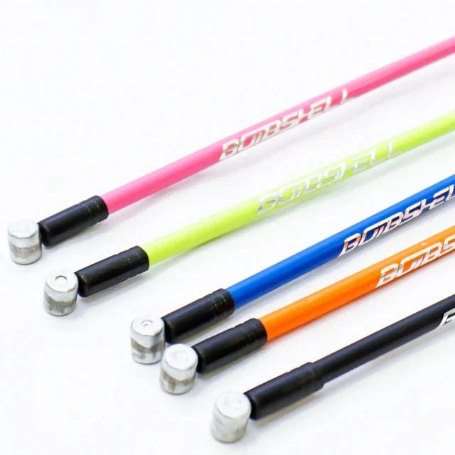 Bombshell brake cables in several colours on a white background.