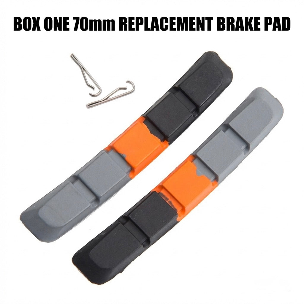SSS Racing Box One Replacement Brake Pads 70mm: gray and orange pads with black ends, chrome retaining clips visible clearly