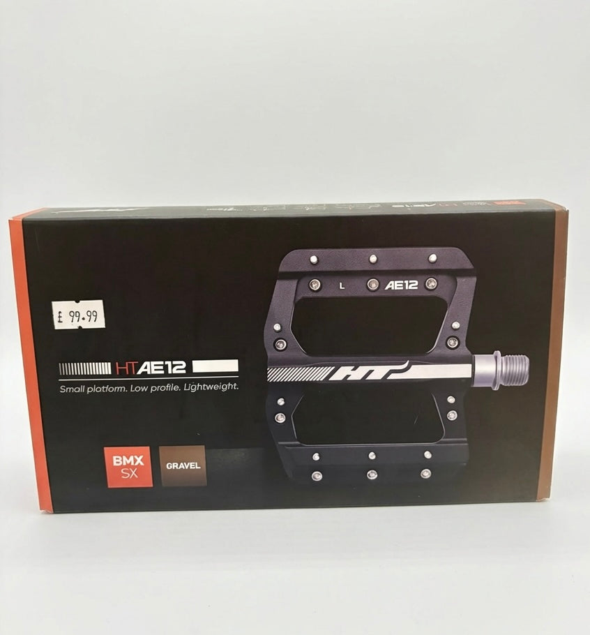 SSS Racing HT AE12 Pedals (Junior) in matte black aluminum body with silver bolts, blue markers, compact low-profile design.
