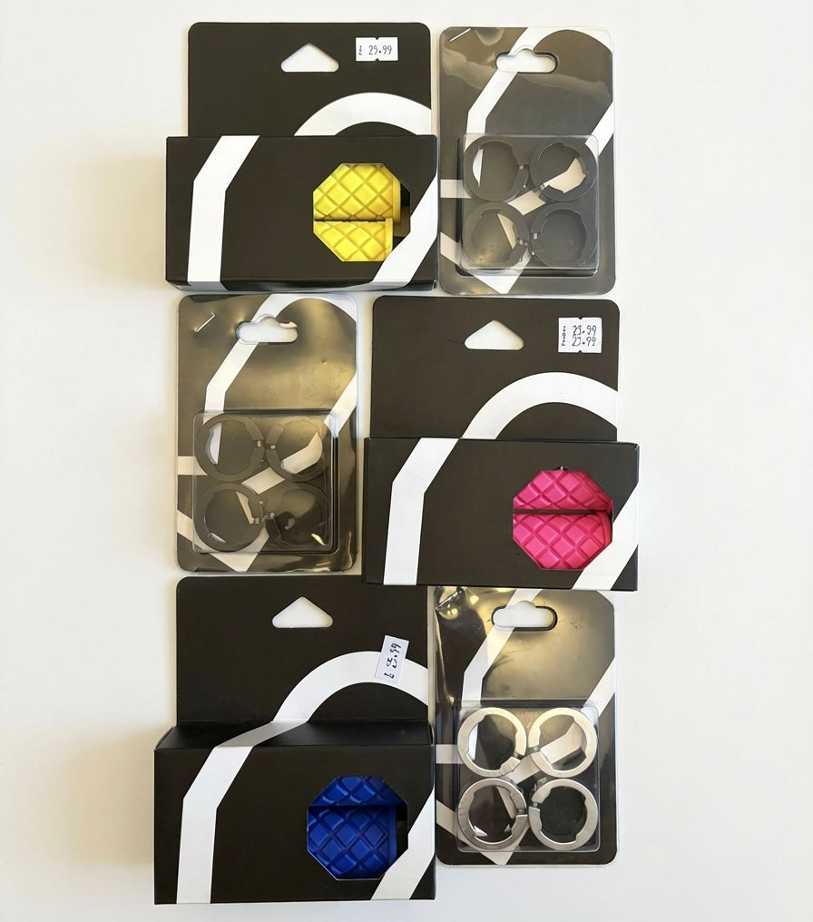 SSS Racing Bombshell 120mm Lock-On Grips (Large): yellow, pink, blue, black silicone with quilted pattern and metal clamps.