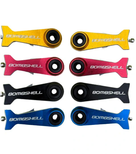 Bombshell Chain Tensioners Pro by SSS Racing in anodized aluminum: yellow, pink, blue with white branding and bearing eye