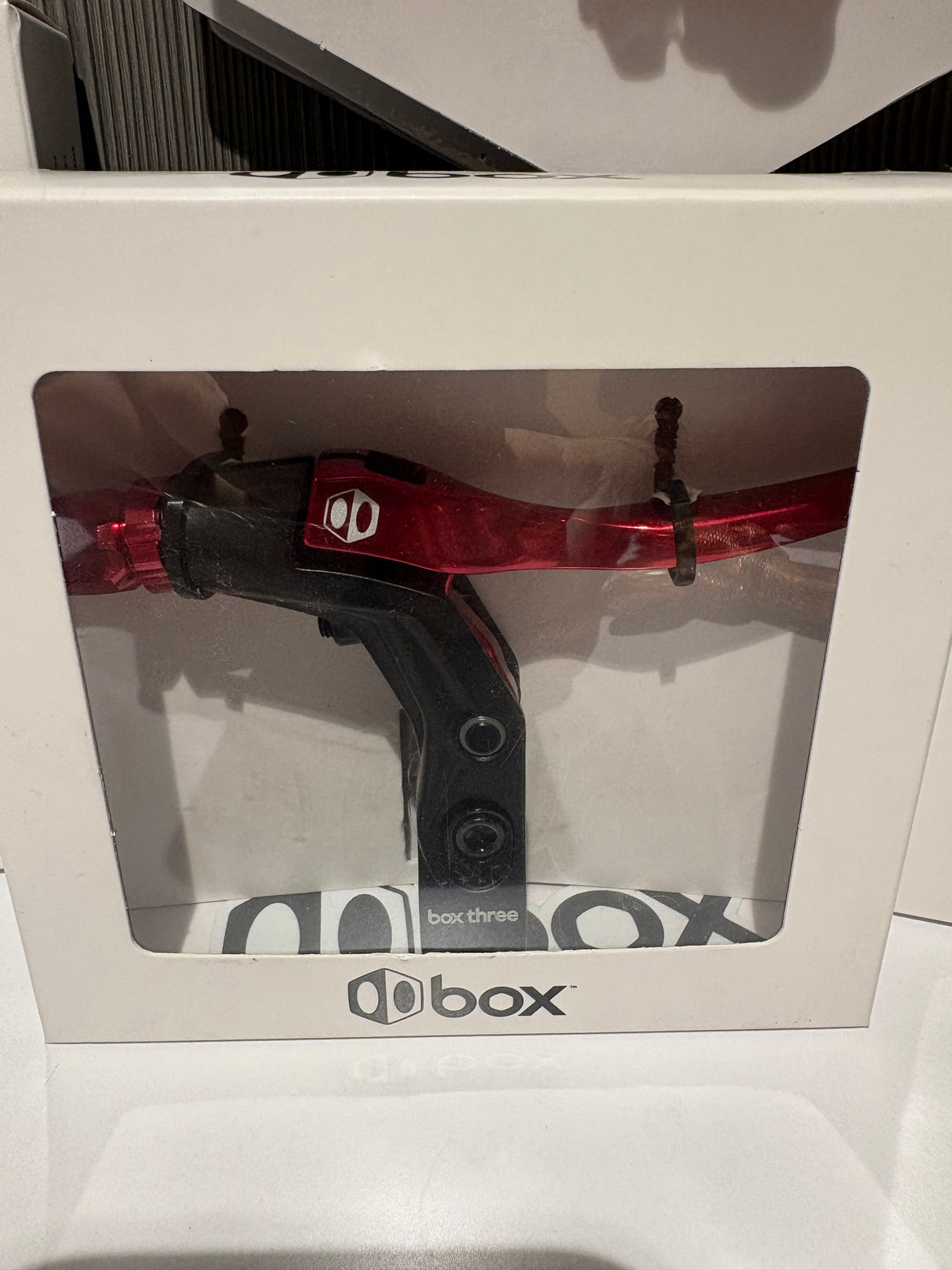 Box Three V-Point Short Reach Brave Lever by SSS Racing: red anodized aluminum lever, black grip, silver bolts, glossy finish