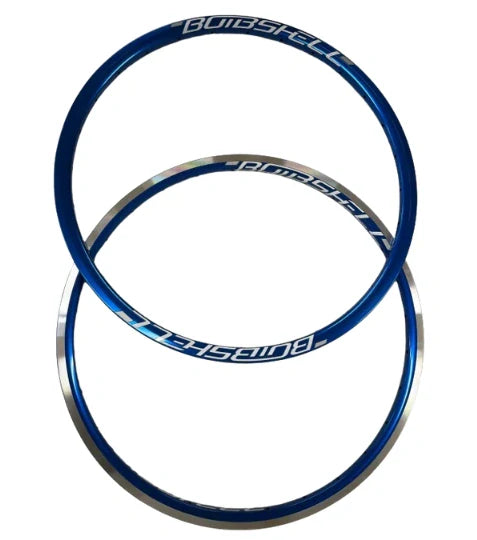 Bombshell ALU rims Mini/Expert 28H in blue metallic aluminum with silver accents, bold rim edges, SSS Racing branding Pro