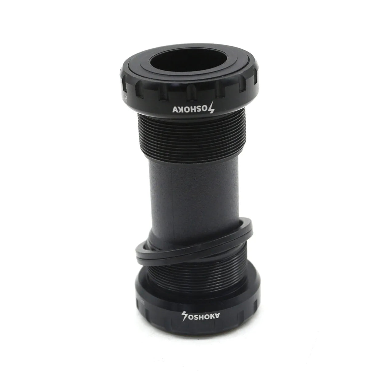 Yoshoka Euro Bottom 24mm SSS Racing black anodized aluminum bottom bracket with knurled collars, matte finish, 24mm spindle