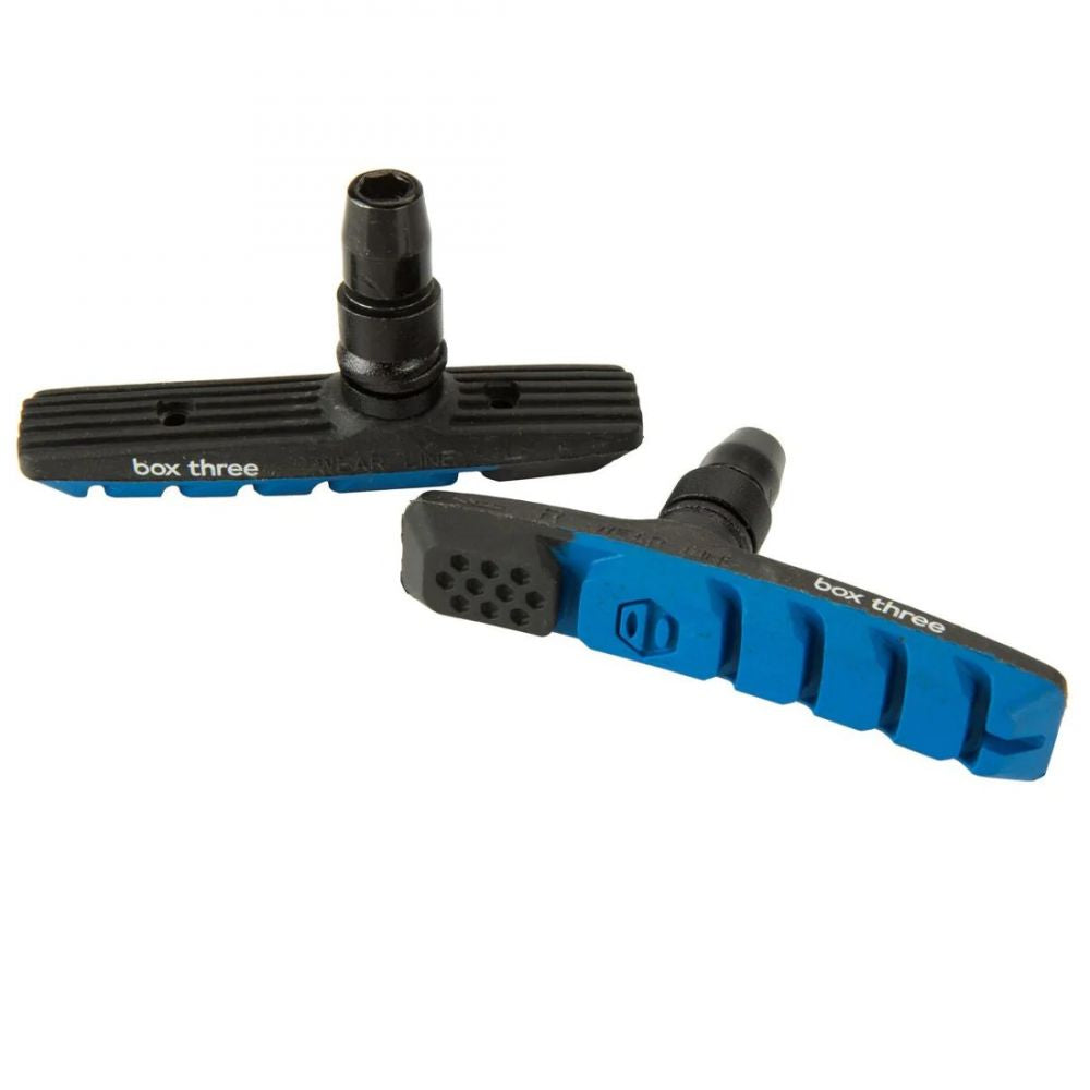 SSS Racing Box Three 70mm Brake Shoes in black and blue, ribbed bodies with blue accents; textured surfaces and studs!!!