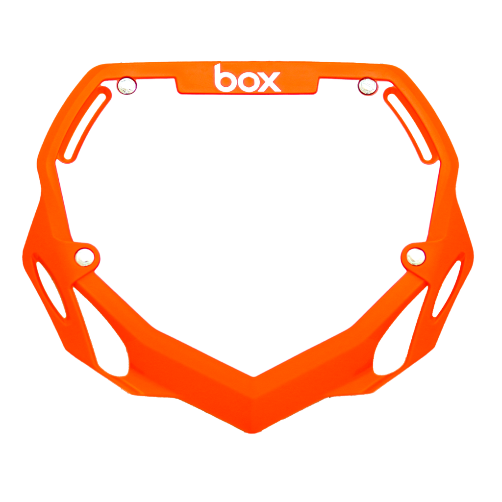 Box Two BMX Number Plates by SSS Racing, bright orange frame with cutout vents, silver hardware, bold white logo, tested