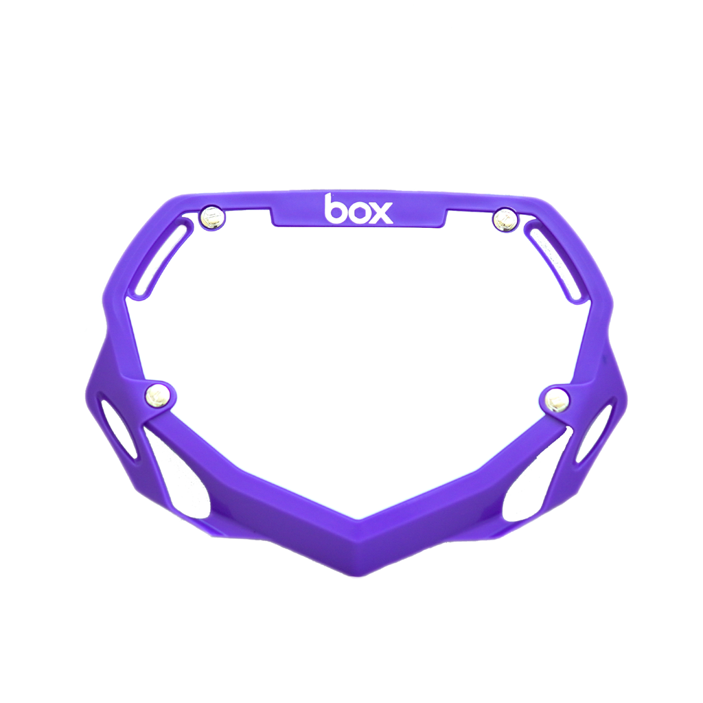 Box Two BMX Number Plates by SSS Racing in vivid purple, durable plastic frame with cutouts, silver bolts, bold white logo.
