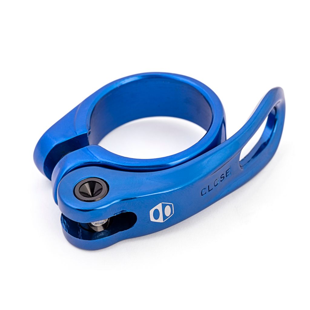 Box Two Quick Release Seat Post Clamp 31.8mm by SSS Racing, blue anodized aluminum, compact lever, silver bolt, curved jaws.