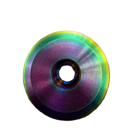 SSS Racing Stem Headset Top Cap in iridescent rainbow anodized aluminum with purple center and green edge, metallic finish.
