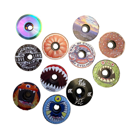 Stem Headset Top Cap by SSS Racing in rainbow anodized titanium with circular bore and vivid metallic edge, glossy finish.