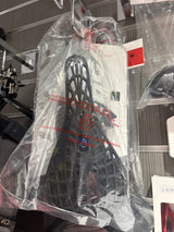 SSS Racing Tioga D-Spyder Saddle in black lattice polymer shell, orange accents, rugged cutout design, packaged for display.