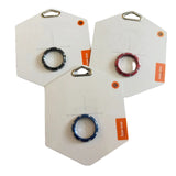 Box One Aluminium Hub Lock Ring, circular blue and red rings on white cards with orange stickers and metal hanging loops