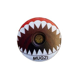 Stem Headset Top Cap by SSS Racing in red-to-gold gradient, white jagged teeth motif, metallic finish round bearing inset.