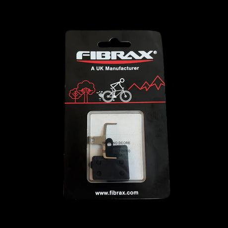 Fibrax High Performance Disc Brake Pads for Shimano Deore on black card with white logo, red swoosh, bicycle and trees icons.