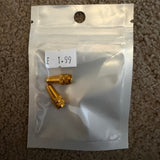 Aluminium Presta Valve Caps in bright gold, cylindrical knurled ends, shown on a silver pouch small beside €1.99 label tag.