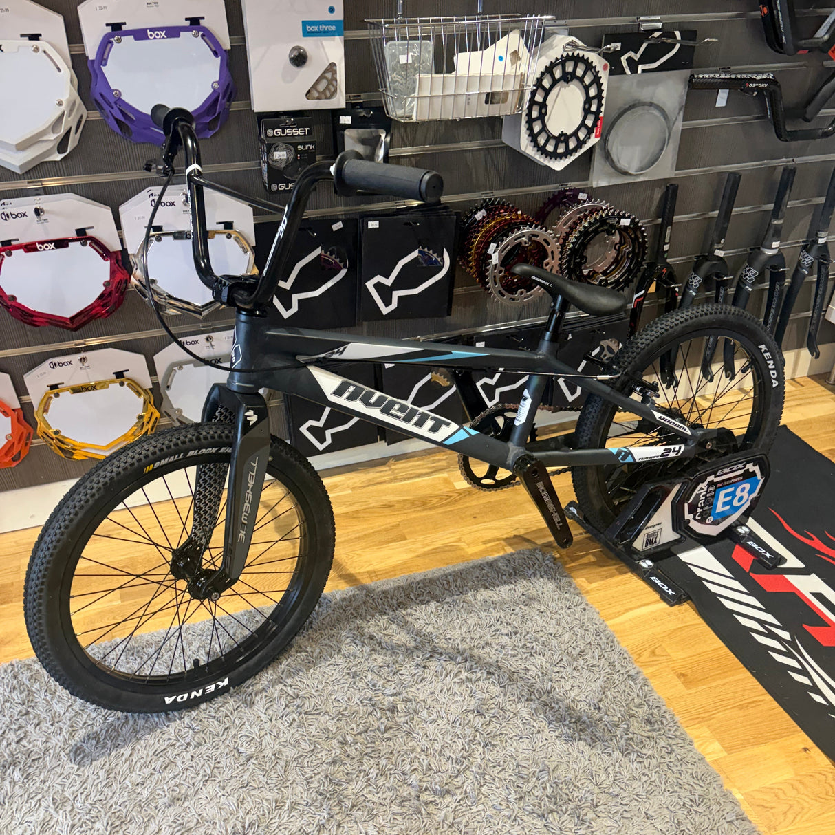 Bombshell Avent Vandal bike - PRO in Gunmetal Grey on a matte grey frame with blue accents, rugged tires, SSS Racing brand