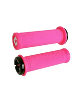ODI Ruffian Mini Grips in bright pink with black collars, compact cylindrical shape, textured knurling, red logo on end cap.