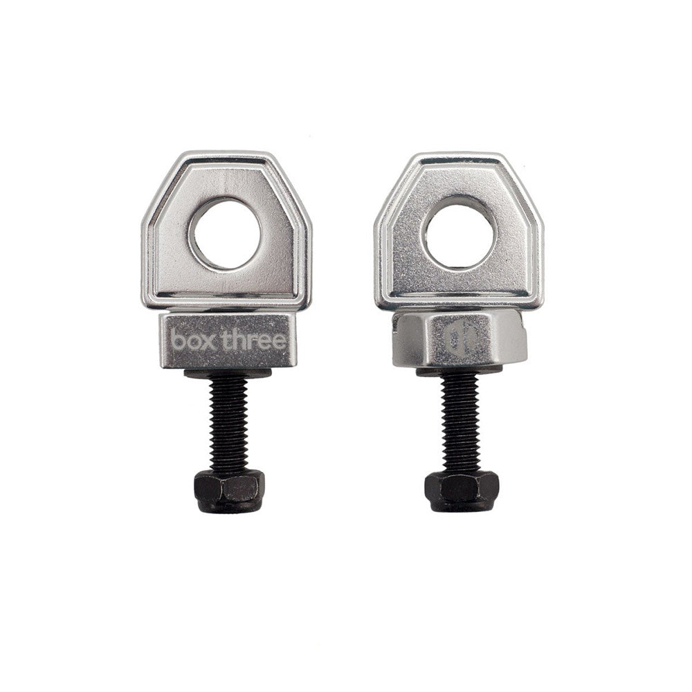 SSS Racing Box Three Chain Tensioners (single hole) silver aluminum bodies with black threaded bolts and hex nuts coated
