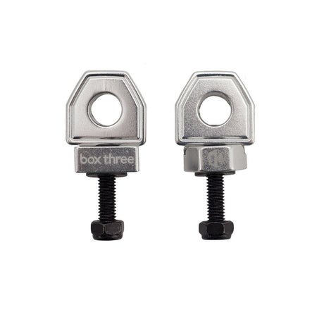 SSS Racing Box Three Chain Tensioners (single hole) silver aluminum bodies with black threaded bolts and hex nuts coated