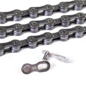 SSS Racing Box Three Prime 9 3/32" Chain with dark gray steel links, polished rivets, and compact rugged design rugged look.