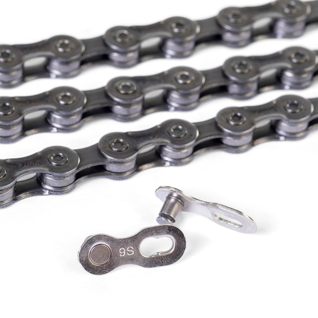 SSS Racing Box Three Prime 9 3/32" Chain with dark gray steel links, polished rivets, and compact rugged design rugged look.