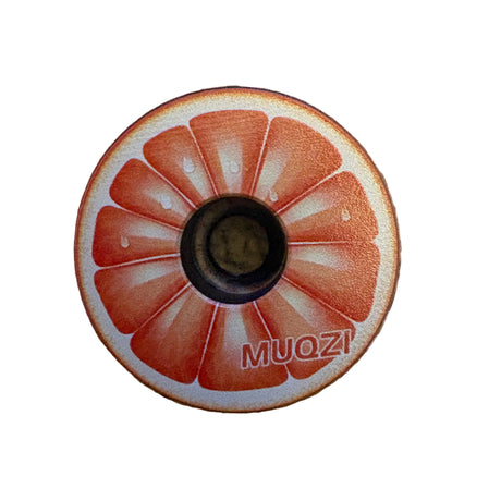 Stem Headset Top Cap by SSS Racing in anodized aluminum with black inner bore, citrus-ray texture, orange accents, finish.