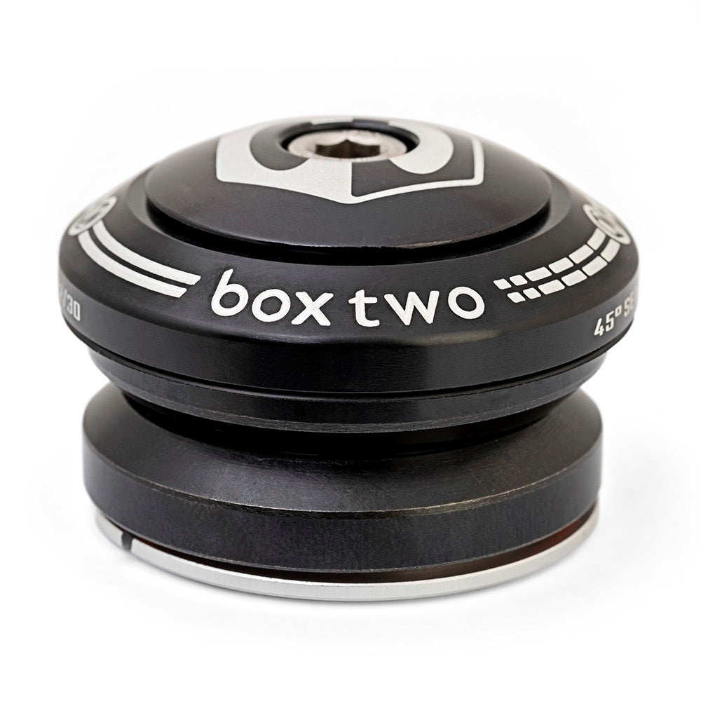 SSS Racing Box Two 1-1/8 Integrated Headset in matte black aluminum with silver top cap, white text and rings accents...