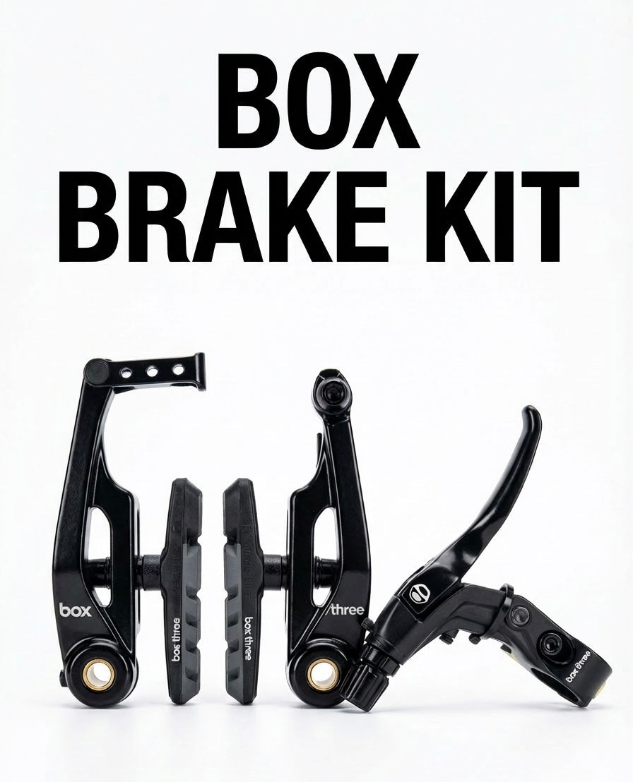 Box Three V-Brake Kit (Short) 85mm, SSS Racing: black anodized aluminum frame, grey brake pads, compact levers black-coated.