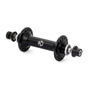 Box Three Stealth Expert Front Hub in black with a cylindrical body, perforated flanges, silver bearings, and compact caps.