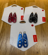 SSS Racing Box Two Chain Tensioners in blue aluminum, red and black variants with silver bolts, cutouts and glossy finish