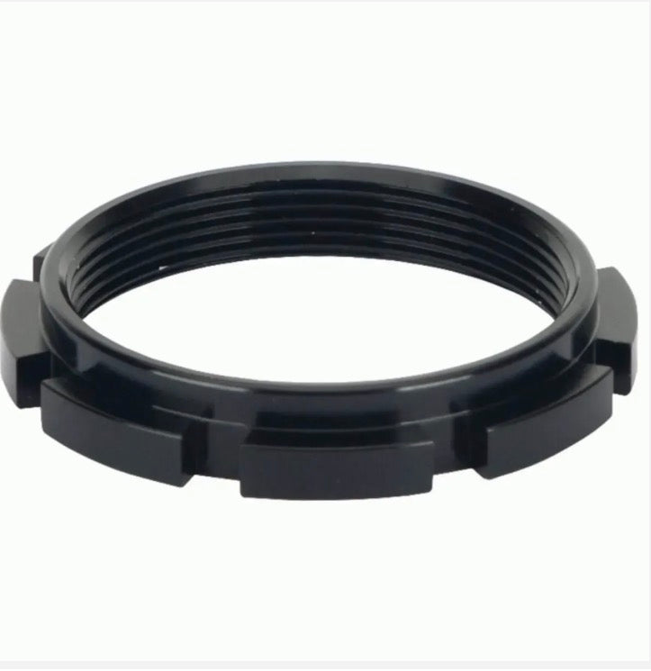 Box One Aluminium Hub Lock Ring, black circular ring with six external lugs and threaded inner surface, compact profile.
