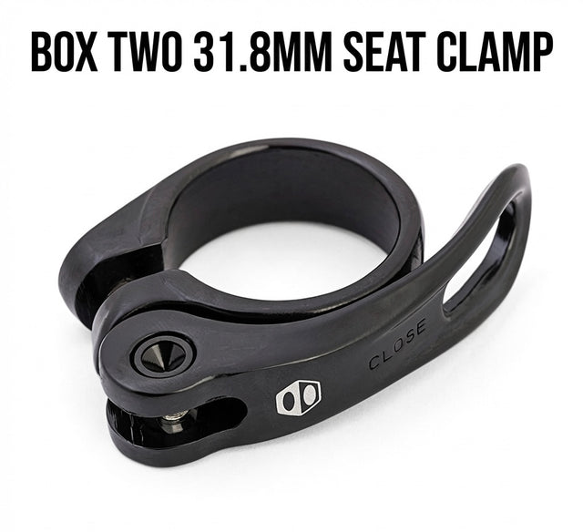 SSS Racing Box Two Quick Release Seat Post Clamp 31.8mm, black aluminum body with silver bolt, compact open clamp, sleek
