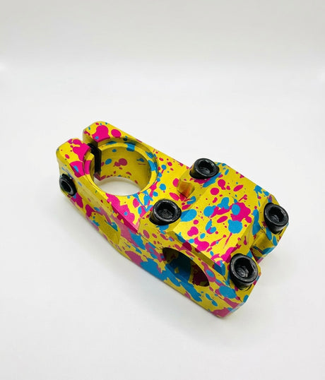 Yoshoka Stem 1-1/8” Steerer 45mmyellow with pink/blue paint splatter, aluminum body, black bolts, SSS Racing finish gloss.