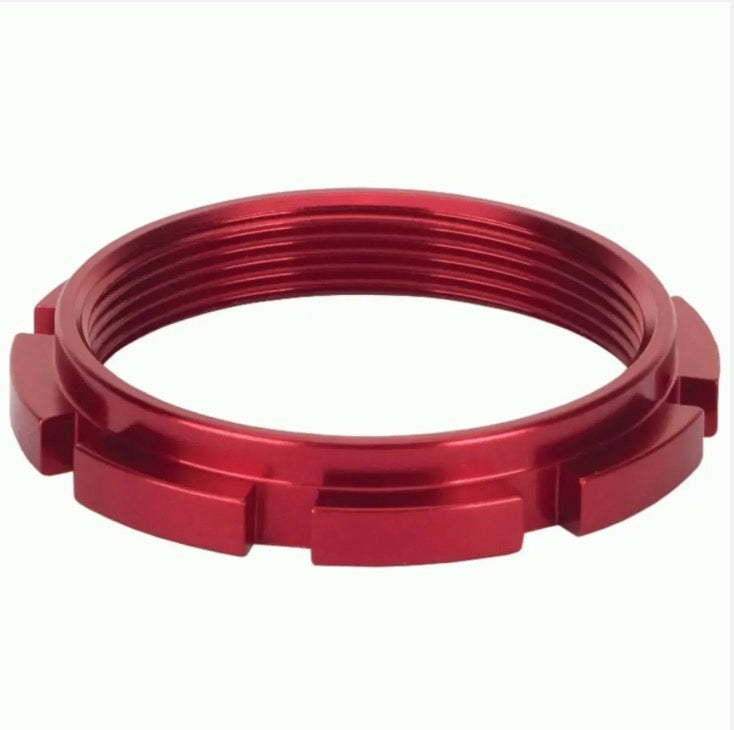 Box One Aluminium Hub Lock Ring in red, circular ring with threads and rectangular external tabs for secure installation.