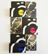 SSS Racing Bombshell 120mm Lock-On Grips (Large): yellow, pink, blue, black silicone with quilted pattern and metal clamps.