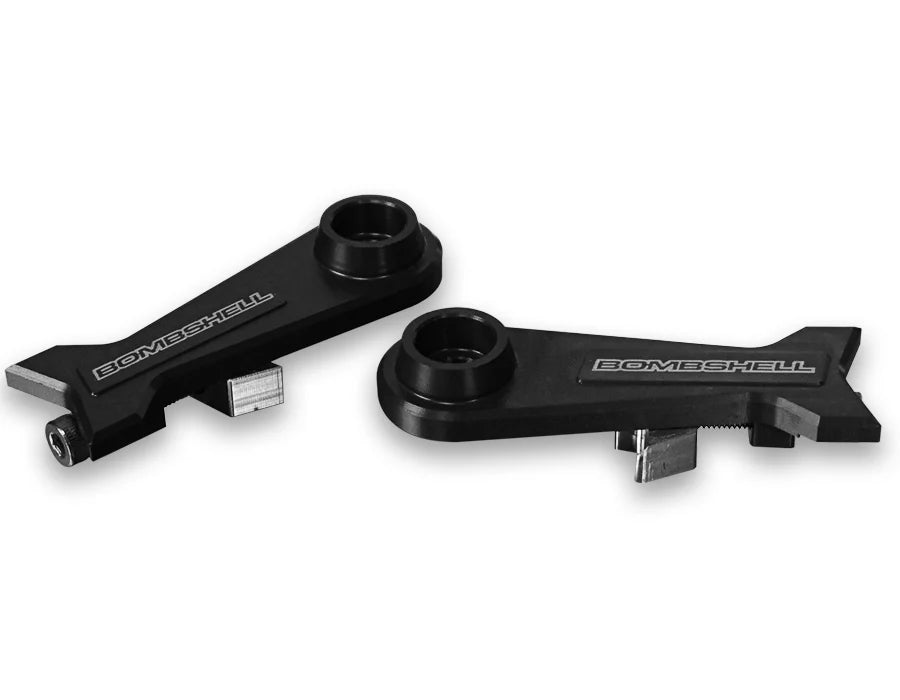Bombshell Chain Tensioners Pro by SSS Racing, black anodized aluminum, silver bolts, arms embossed with Bombshell logo badge