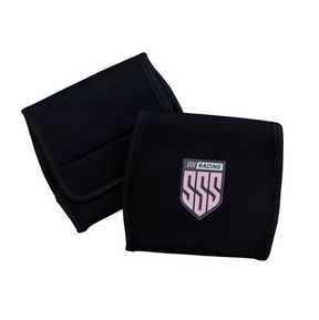 Pedal Protector Covers in black fabric, folded rectangular panels with stitched edges and a pink SSS RACING badge. Glossy