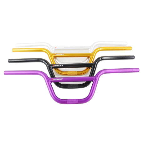 Set of four bicycle handlebar colors (gold, black, purple, silver) on a white background