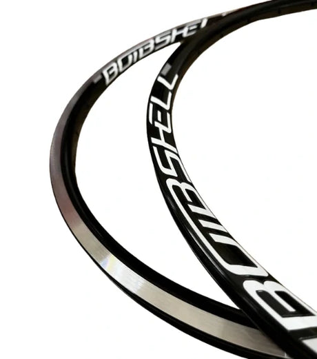 SSS Racing Bombshell ALU rims Mini/Expert 28H, black aluminum with white logos, glossy finish and red edge accents at rim