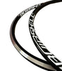 SSS Racing Bombshell ALU rims Mini/Expert 28H, black aluminum with white logos, glossy finish and red edge accents at rim