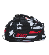 Bombshell Training Kit Bag in black, white, and red with star pattern, compact rounded shape, multiple zip pockets, handles.