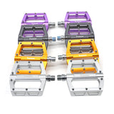 Yoshoka Race Pedal YSA-BRP303 by SSS Racing in purple, blue, orange, gray anodized aluminum, textured pedal body screws.