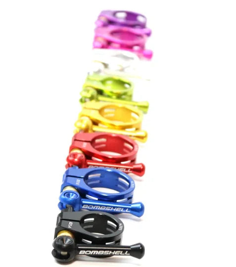 Bombshell Seat Post Clamp 31.8mm (Ti) in blue, black, red, gold, green aluminum clamps; SSS Racing logo, anodized finish.