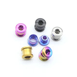 SSS Racing Yoshoka Titanium Chainring Bolts (8.5x4mm) anodized titanium finish with blue, purple, gold, pink accents style.